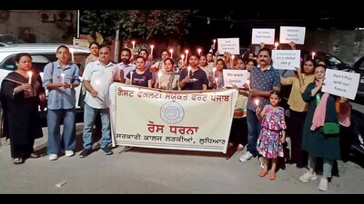 Guest teachers during the candle march in Ludhiana on Thursday. (HT Photo) Guest teachers during the candle march in Ludhiana on Thursday. (HT Photo)