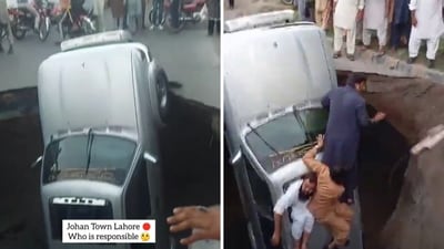 A sinkhole swallowed three vehicles, including a car, in Lahore. (X/@ShirazHassan) A sinkhole swallowed three vehicles, including a car, in Lahore. (X/@ShirazHassan)