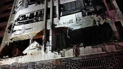 Damaged apartments hit by an Israeli airstrike are seen, in Beirut, Lebanon, Thursday. (AP Photo) Damaged apartments hit by an Israeli airstrike are seen, in Beirut, Lebanon, Thursday. (AP Photo)
