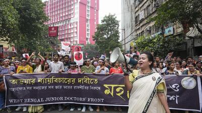 Members of Bengal Junior Doctors' Front and others take part in a mega rally on October 2 to demand justice for the trainee doctor who was raped and killed at RG Kar Medical College and Hospital in Kolkata (PTI)
