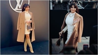Nora Fatehi made her Paris Fashion Week debut by attending the Louis Vuitton show as the luxury fashion house's special guest. She wore a white full-sleeved mini dress paired with a beige trench coat, matching heeled boots, an LV bag, a chain-link gold necklace, hoop earrings, hair tied in a ponytail, and striking glam. Nora Fatehi made her Paris Fashion Week debut by attending the Louis Vuitton show as the luxury fashion house's special guest. She wore a white full-sleeved mini dress paired with a beige trench coat, matching heeled boots, an LV bag, a chain-link gold necklace, hoop earrings, hair tied in a ponytail, and striking glam. 