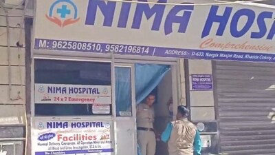 A police official and others during an investigation at Nima Hospital where a doctor was allegedly shot dead, in New Delhi, Thursday, Oct. 3, 2024. (PTI) A police official and others during an investigation at Nima Hospital where a doctor was allegedly shot dead, in New Delhi, Thursday, Oct. 3, 2024. (PTI)