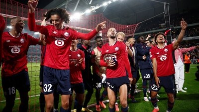 Lille's Tiago Santos and Ayyoub Bouaddi celebrate after the match (REUTERS)