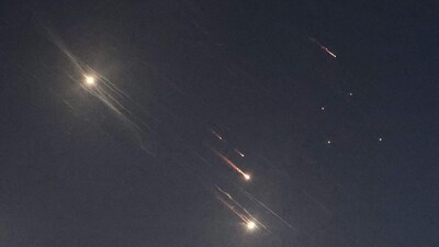 Several airlines, including Etihad Airways and Emirates Airlines, have changed their flight paths to ensure passenger safety after Iran's missile attack. This picture shows projectiles being intercepted by Israel above Tel Aviv on October 1, 2024. (AFP) Several airlines, including Etihad Airways and Emirates Airlines, have changed their flight paths to ensure passenger safety after Iran's missile attack. This picture shows projectiles being intercepted by Israel above Tel Aviv on October 1, 2024. (AFP)