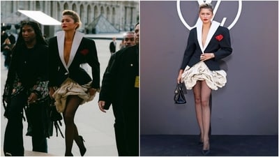 Zendaya turned up at the Louis Vuitton Spring Summer show in a blazer with an oversized collar and a red rose adorned on the bust. She wore it over a ruffled skirt, sheer stockings, a Louis Vuitton bag, her blonde hair tied in a coiffed hairdo, black pumps, and bright red lips. Zendaya turned up at the Louis Vuitton Spring Summer show in a blazer with an oversized collar and a red rose adorned on the bust. She wore it over a ruffled skirt, sheer stockings, a Louis Vuitton bag, her blonde hair tied in a coiffed hairdo, black pumps, and bright red lips. 