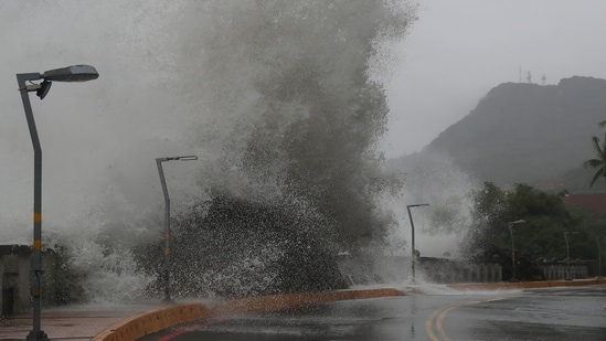 Waves crash on the coastline in Kaohsiung, southern Taiwan as Typhoon Krathon approaches to Taiwan. Taiwan travel alert: Southern cities flooded as Typhoon Krathon makes landfall (AP Photo/Chiang Ying-ying)
