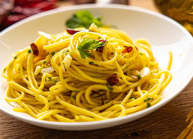 Aglio olio is a popular pasta in India because Italian food is packed with umami flavours. (ADOBE STOCK) Aglio olio is a popular pasta in India because Italian food is packed with umami flavours. (ADOBE STOCK)