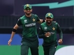 Pakistan's Babar Azam celebrates with Shaheen Shah Afridi during T20 World Cup 2024