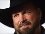 (FILES) US singer Garth Brooks arrives for the 2019 MusiCares Person Of The Year gala at the Los Angeles Convention Center in Los Angeles on February 8, 2019. A lawsuit filed in California on October 3, 2024 alleged that US country music star Garth Brooks raped a makeup artist in her hotel room. The woman, identified by the pseudonym Jane Doe, claims the singer repeatedly subjected her to unwanted sexual advances, including exposing himself and groping her. (Photo by Valerie MACON / AFP) (FILES) US singer Garth Brooks arrives for the 2019 MusiCares Person Of The Year gala at the Los Angeles Convention Center in Los Angeles on February 8, 2019. A lawsuit filed in California on October 3, 2024 alleged that US country music star Garth Brooks raped a makeup artist in her hotel room. The woman, identified by the pseudonym Jane Doe, claims the singer repeatedly subjected her to unwanted sexual advances, including exposing himself and groping her. (Photo by Valerie MACON / AFP)
