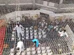 Tribal MLAs led by deputy speaker Narhari Jhirwal jumped onto the second-floor safety net of the Mantralaya quadrangle. (Screengrab)