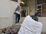 The building has been vacated in the aftermath of the slab collapse and residents have been moved to a transit camp, said officials. Instructions have also been issued to residents to remove their false ceilings, the officials added. (Photo by Anshuman Poyrekar/ Hindustan Times) (Hindustan Times)