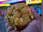 The Tirupati laddu is made by the Tirumala Tirupati Devasthanam which manages the Tirumala Venkateswara temple.