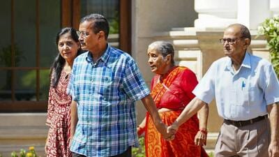 Arvind Kejriwal leaves the Delhi chief minister’s official residence with his wife and parents on Friday in New Delhi. (PTI) Arvind Kejriwal leaves the Delhi chief minister’s official residence with his wife and parents on Friday in New Delhi. (PTI)