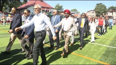 Former J&K CM Omar Abdullah participating in a march-past with his batch mates during the 177th Founders Day celebrations at Lawrence School, Sanawar, on Friday. (HT Photo)