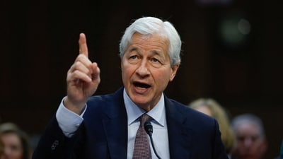 FILE PHOTO: JPMorgan Chase CEO and Chairman Jamie Dimon gestures as he speaks during the U.S. Senate Banking, Housing and Urban Affairs Committee oversight hearing on Wall Street firms, on Capitol Hill in Washington, U.S., December 6, 2023. REUTERS/Evelyn Hockstein/File Photo (REUTERS)