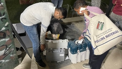 Polling officials with EVMs and other polling materials. (PTI file) Polling officials with EVMs and other polling materials. (PTI file)