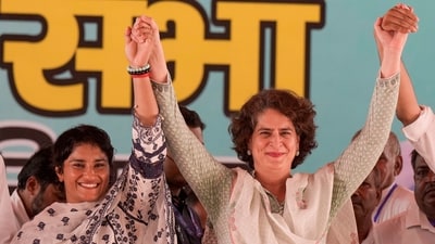 Julana: Congress leader Priyanka Gandhi Vadra with party candidate Vinesh Phogat (left) during the party's Haryana Vijay Sankalp Jansabha, in Julana, Haryana, Wednesday, Oct. 2, 2024. (PTI Photo/Manvender Vashist Lav) Julana: Congress leader Priyanka Gandhi Vadra with party candidate Vinesh Phogat (left) during the party's Haryana Vijay Sankalp Jansabha, in Julana, Haryana, Wednesday, Oct. 2, 2024. (PTI Photo/Manvender Vashist Lav)