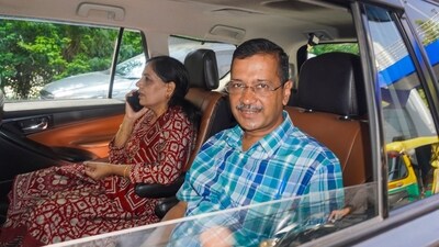 Former Delhi chief minister Arvind Kejriwal and wife Sunita Kejriwal leave after vacating the official residence at Civil Lines area in New Delhi on Friday. (PTI) Former Delhi chief minister Arvind Kejriwal and wife Sunita Kejriwal leave after vacating the official residence at Civil Lines area in New Delhi on Friday. (PTI)