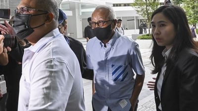 Ong Beng Seng, managing director of Hotel Properties Ltd., center, arrives at the State Courts in Singapore. (Bloomberg) Ong Beng Seng, managing director of Hotel Properties Ltd., center, arrives at the State Courts in Singapore. (Bloomberg)
