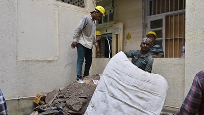 The building has been vacated in the aftermath of the slab collapse and residents have been moved to a transit camp, said officials. Instructions have also been issued to residents to remove their false ceilings, the officials added. (Photo by Anshuman Poyrekar/ Hindustan Times) (Hindustan Times) The building has been vacated in the aftermath of the slab collapse and residents have been moved to a transit camp, said officials. Instructions have also been issued to residents to remove their false ceilings, the officials added. (Photo by Anshuman Poyrekar/ Hindustan Times) (Hindustan Times)