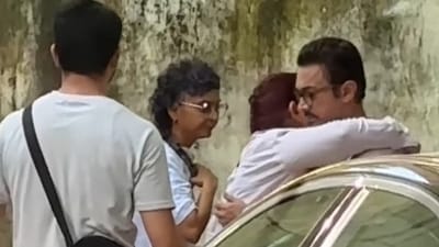 Aamir Khan hugs daughter Ira Khan as Kiran Rao looks on, at last rites of Reena Dutta's father Aamir Khan hugs daughter Ira Khan as Kiran Rao looks on, at last rites of Reena Dutta's father