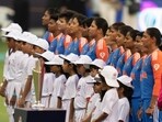 Indian players stand for their national anthem ahead of the ICC Women's T20 World Cup 2024 match between India and New Zealand at Dubai International Stadium, United Arab Emirates Indian players stand for their national anthem ahead of the ICC Women's T20 World Cup 2024 match between India and New Zealand at Dubai International Stadium, United Arab Emirates