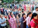 Voters in a queue to cast their votes for the final phase of the Jammu and Kashmir Assembly elections at a polling station, in Jammu on October 1.