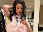 Kourtney Kardashian's Halloween decorations sparked outrage online, particularly an image of skeletons in a sexual position.