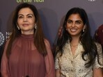Mukesh Ambani with Nita Ambani, daughter Isha Ambani and son-in-law Anand Piramal during the 'Wildlife Photographer of the Year' exhibition by London's Natural History Museum in Mumbai on Friday, (PTI)
