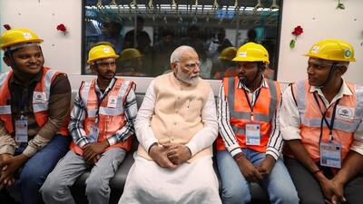 **EDS: IMAGE VIA @narendramodi ON SATURDAY, OCT 5, 2024** Mumbai: Prime Minister Narendra Modi interacts with the labourers involved in constructing the underground line during a ride in the newly inaugurated metro train of the Bandra-Kurla Complex (BKC) to Aarey JVLR section of Mumbai Metro Line 3, Maharashtra, Saturday, Oct 5, 2024. (PTI Photo)(PTI10_05_2024_000413B) (PTI) **EDS: IMAGE VIA @narendramodi ON SATURDAY, OCT 5, 2024** Mumbai: Prime Minister Narendra Modi interacts with the labourers involved in constructing the underground line during a ride in the newly inaugurated metro train of the Bandra-Kurla Complex (BKC) to Aarey JVLR section of Mumbai Metro Line 3, Maharashtra, Saturday, Oct 5, 2024. (PTI Photo)(PTI10_05_2024_000413B) (PTI)