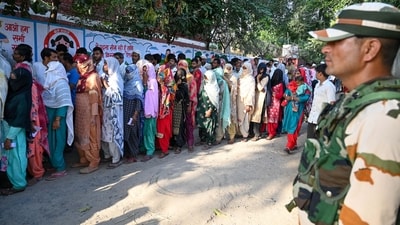 Women voters wait outside a polling booth to cast their votes during the Haryana Assembly Election at Raipur village in Nuh, Mewat, on Saturday, 05 October 2024. (Photo by Parveen Kumar/Hindustan Times) Women voters wait outside a polling booth to cast their votes during the Haryana Assembly Election at Raipur village in Nuh, Mewat, on Saturday, 05 October 2024. (Photo by Parveen Kumar/Hindustan Times)