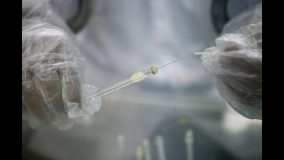 A research assistant prepares a syringe inside a pharmacy glovebox at the reversible inhibition of sperm under guidance (RISUG) male contraceptive treatment research and development laboratory at Indian Institute of Technology (IIT) Kharagpur in Kharagpur, West Bengal, India, on Feb. 16, 2017. Photographer: Sumit Dayal/Bloomberg via Getty Images (Bloomberg via Getty Images) A research assistant prepares a syringe inside a pharmacy glovebox at the reversible inhibition of sperm under guidance (RISUG) male contraceptive treatment research and development laboratory at Indian Institute of Technology (IIT) Kharagpur in Kharagpur, West Bengal, India, on Feb. 16, 2017. Photographer: Sumit Dayal/Bloomberg via Getty Images (Bloomberg via Getty Images)