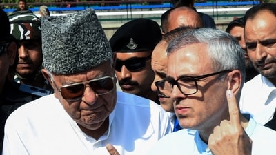 Jammu and Kashmir National Conference vice president and party candidate from Ganderbal and Budgam assembly seat Omar Abdullah with his father and party chief Farooq Abdullah. (ANI file) Jammu and Kashmir National Conference vice president and party candidate from Ganderbal and Budgam assembly seat Omar Abdullah with his father and party chief Farooq Abdullah. (ANI file)