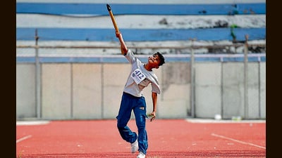 An athlete in action during the Open State Athletics Championship at Guru Nanak Stadium in Ludhiana on Saturday. (Manish/HT)