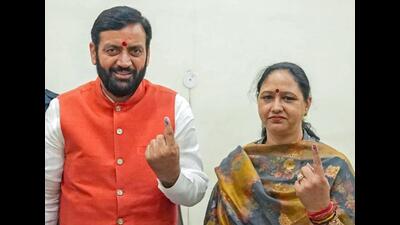 Chief minister Nayab Saini with his wife Suman after casting their vote at a booth in Mirzapur Majra village of Naraingarh in Ambala district on Saturday. He is contesting from Ladwa assembly constituency in Kurukshetra district. (HT Photo) Chief minister Nayab Saini with his wife Suman after casting their vote at a booth in Mirzapur Majra village of Naraingarh in Ambala district on Saturday. He is contesting from Ladwa assembly constituency in Kurukshetra district. (HT Photo)