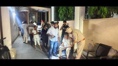 Cops during investigation at the crime scene in Model Town Extension of Ludhiana district on Saturday evening. Cops during investigation at the crime scene in Model Town Extension of Ludhiana district on Saturday evening.