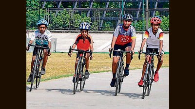 Cyclists in action during the Punjab State Cycling Championship at PAU in Ludhiana on Saturday. (Manish/HT)