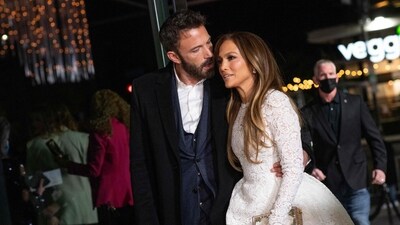 US actress Jennifer Lopez and actor Ben Affleck arrive for a special screening of "Marry Me" at the Directors Guild of America (DGA) in Los Angeles, February 8, 2022. (Photo by VALERIE MACON / AFP) (AFP) US actress Jennifer Lopez and actor Ben Affleck arrive for a special screening of "Marry Me" at the Directors Guild of America (DGA) in Los Angeles, February 8, 2022. (Photo by VALERIE MACON / AFP) (AFP)