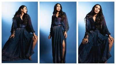 Karisma Kapoor rocked a dark blue, airy outfit that exuded a classy, bohemian-chic vibe. The slit in the dress added a bold touch to her ensemble, while the pleated maxi skirt flared out beautifully. The blouse stood out with its unique polka-dotted sleeves, infusing a playful yet classy detail. (Instagram/@therealkarismakapoor) Karisma Kapoor rocked a dark blue, airy outfit that exuded a classy, bohemian-chic vibe. The slit in the dress added a bold touch to her ensemble, while the pleated maxi skirt flared out beautifully. The blouse stood out with its unique polka-dotted sleeves, infusing a playful yet classy detail. (Instagram/@therealkarismakapoor)