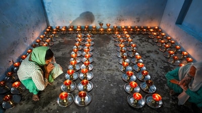 Hindu devotees light lamps at the Baba Sidh Goria temple during Navratri festival celebrations, in Jammu. (PTI) Hindu devotees light lamps at the Baba Sidh Goria temple during Navratri festival celebrations, in Jammu. (PTI)
