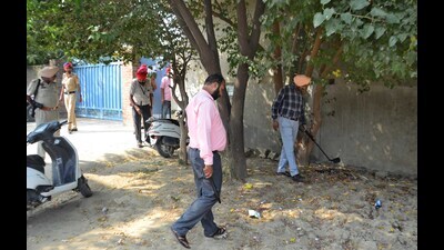 Police inspecting the premises of Sri Guru Harkrishan Adarsh Senior Secondary School, Dhandra, Ludhiana, after a bomb threat was received on Saturday. (Gurpreet Singh/HT) Police inspecting the premises of Sri Guru Harkrishan Adarsh Senior Secondary School, Dhandra, Ludhiana, after a bomb threat was received on Saturday. (Gurpreet Singh/HT)