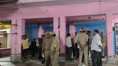 Police personnel investigate after four members of a family were shot dead at their home, in Amethi (PTI Photo) Police personnel investigate after four members of a family were shot dead at their home, in Amethi (PTI Photo)