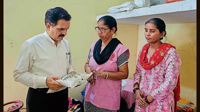 Punjab Food Commission chairman Bal Mukand Sharma inspecting mid-day meals being served at PAU’s Government Elementary School in Ludhiana on Saturday. (HT Photo) Punjab Food Commission chairman Bal Mukand Sharma inspecting mid-day meals being served at PAU’s Government Elementary School in Ludhiana on Saturday. (HT Photo)