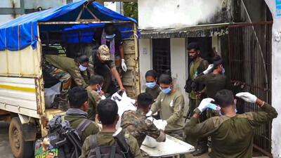 Security personnel shift the mortal remains of the Maoists to a government hospital in Dantewada district. (PTI) Security personnel shift the mortal remains of the Maoists to a government hospital in Dantewada district. (PTI)