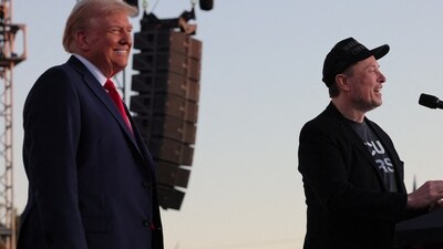 Tesla CEO and X owner Elon Musk speaks as Republican presidential nominee and former U.S. president Donald Trump looks on during a rally at the site of the July assassination attempt against Trump, in Butler, Pennsylvania, U.S., October 5, 2024. REUTERS/Brian Snyder (REUTERS)