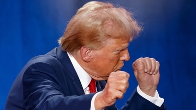 Republican presidential nominee and former U.S. President Donald Trump gestures at the end of a town hall as he campaigns in Fayetteville, North Carolina, U.S. October 4, 2024. (REUTERS)