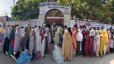 Women voters wait outside a polling booth to cast their votes during the Haryana Assembly Election at Raipur village in Nuh, Mewat, in Gurugram on Saturday. (Parveen Kumar/HT PHOTO) Women voters wait outside a polling booth to cast their votes during the Haryana Assembly Election at Raipur village in Nuh, Mewat, in Gurugram on Saturday. (Parveen Kumar/HT PHOTO)