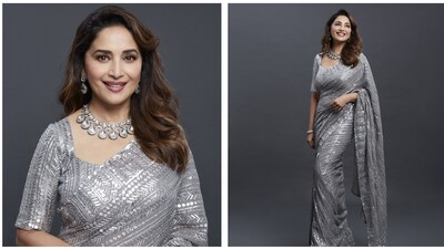 Madhuri Dixit's grey saree is another spin on the sequin saree trend. Silver embellishments and jewellery go well with this look. Madhuri Dixit's grey saree is another spin on the sequin saree trend. Silver embellishments and jewellery go well with this look.