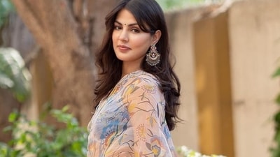 Rhea Chakraborty has been summoned by police in a probe linked to HiBox mobile app. Rhea Chakraborty has been summoned by police in a probe linked to HiBox mobile app.