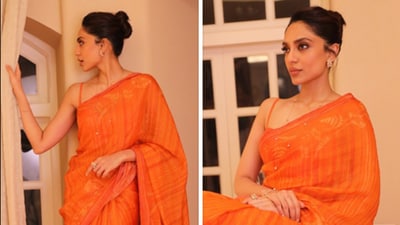 All this too flashy for you? You can still rock a simple orange saree to work or late evening pandal-hopping. Take some tips from Sobhita Dhulipala's demure, mindful saree. All this too flashy for you? You can still rock a simple orange saree to work or late evening pandal-hopping. Take some tips from Sobhita Dhulipala's demure, mindful saree.